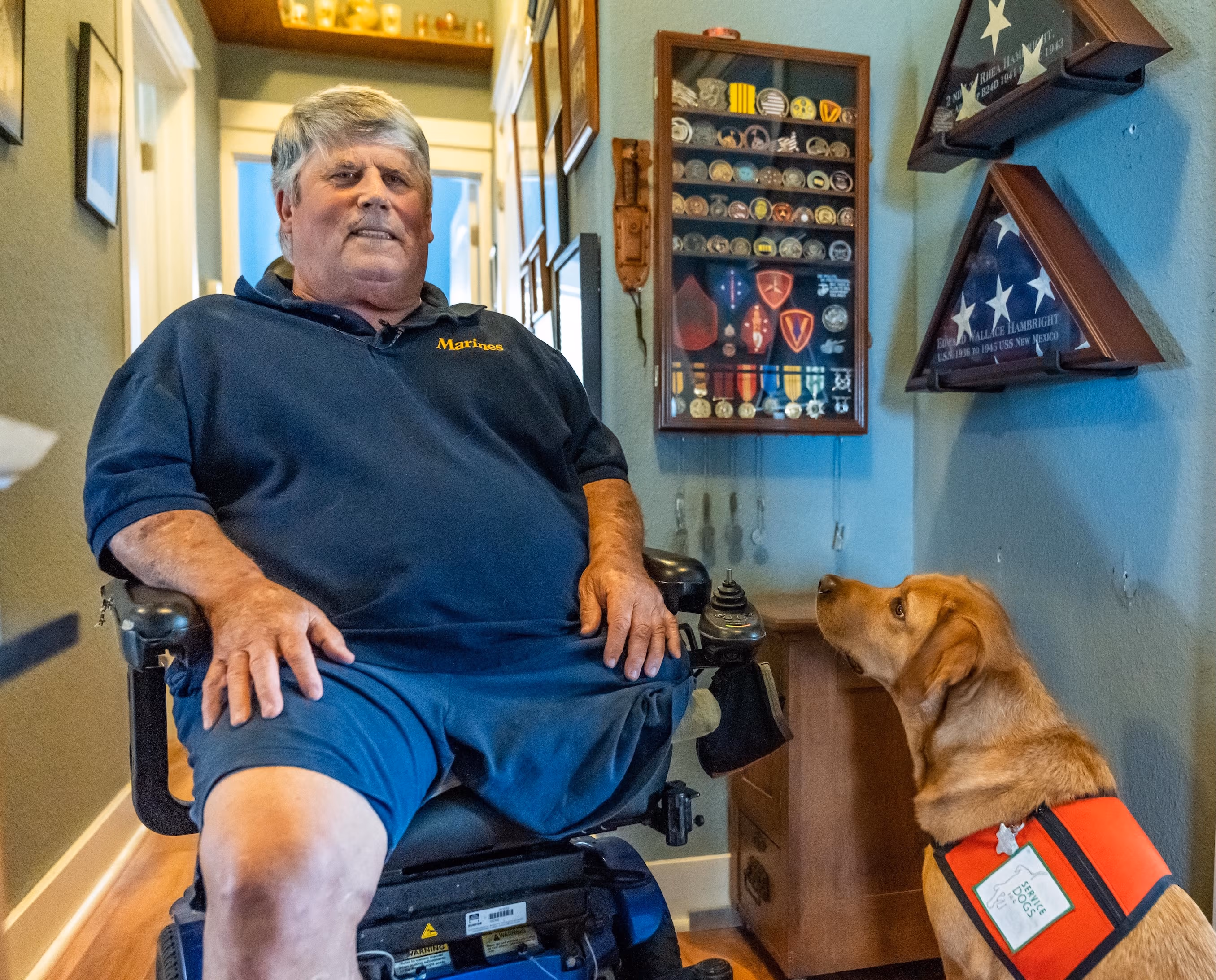U.S. Marine Rhea Hambright with his service dog Beatrice